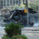Illustration for article titled Dark Knight Rises Set Photos from WENN: Batwing, Tumbler, Catwomans stunt double